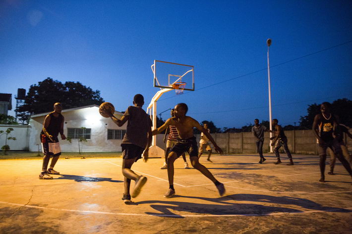 Some medical workers play basketball at the living area of the China-Zambia Friendship Hospital.