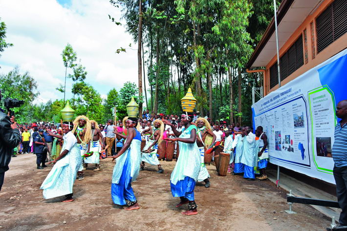 June 28, 2018: Locals perform a dance at the launch ceremony of a digital satellite TV project from China to aid Africa in Musanze, northern Rwanda. This project, mainly implemented by StarTimes, has provided digital television signal to 10,112 villages in 25 African countries since it kicked off in August 2017.  courtesy of StarTimes Group