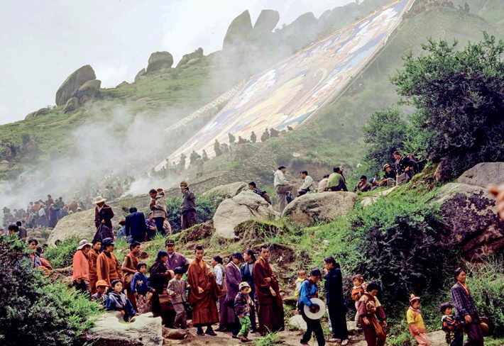 A huge thangka Buddha portrait is exhibited during the Shoton Festival.