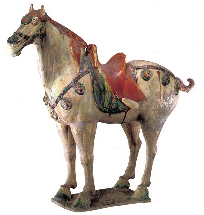 A tri-color glazed porcelain horse of the Tang Dynasty (618-907), housed in the Palace Museum.
