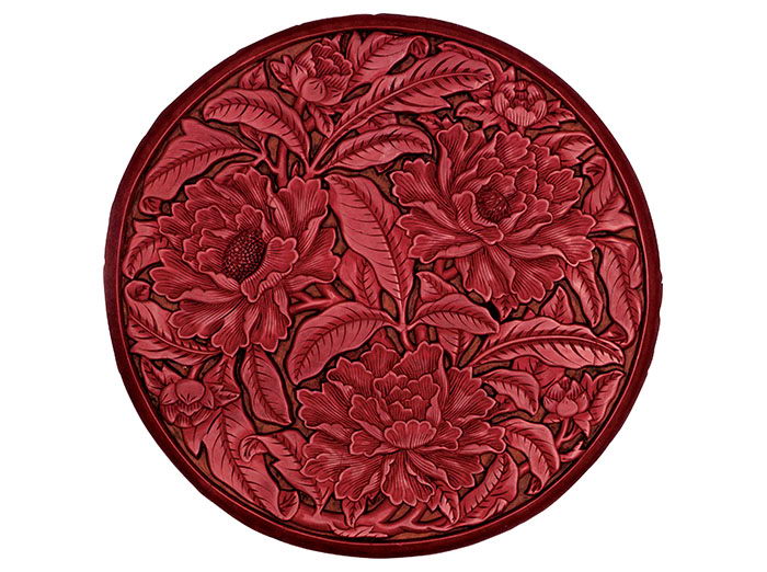 A red plate with peony patterns of the Ming Dynasty (1368-1644), housed in the Palace Museum.